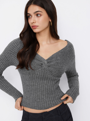 扭结长袖针织上衣