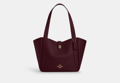 Hadley 旋转扣手提包