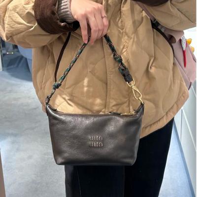 Miu Miu 压花拉链手包