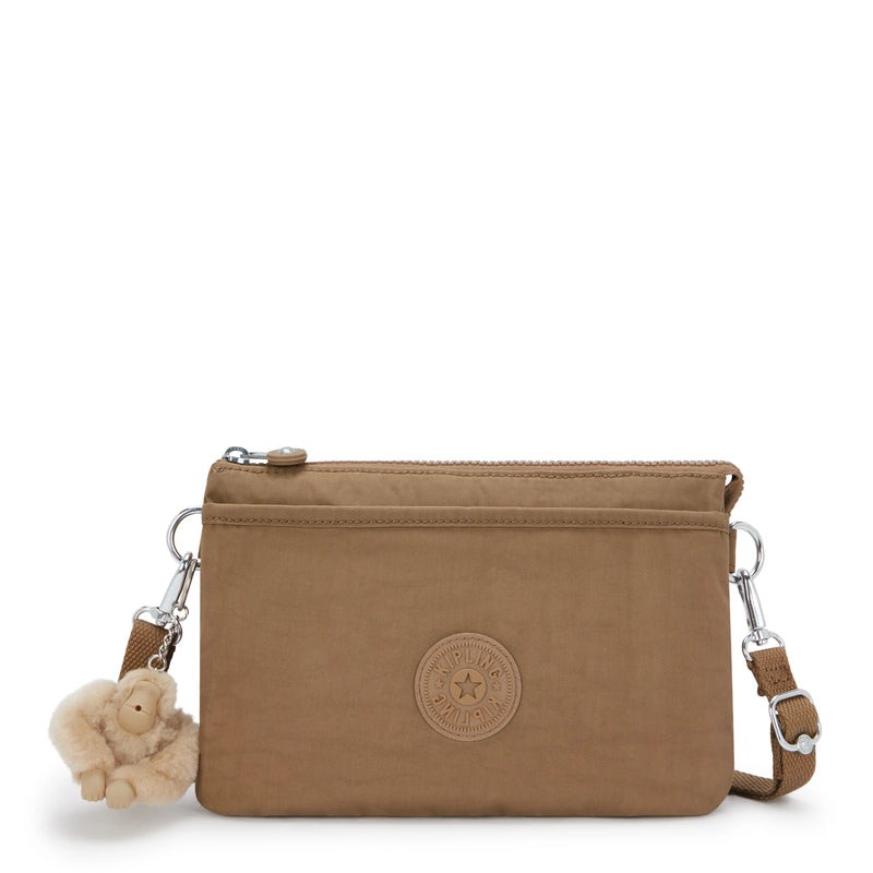 Kipling RIRI 奶杏色小号斜挎包